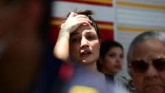 In shattered Cali, residents search for loved ones and signs of hope