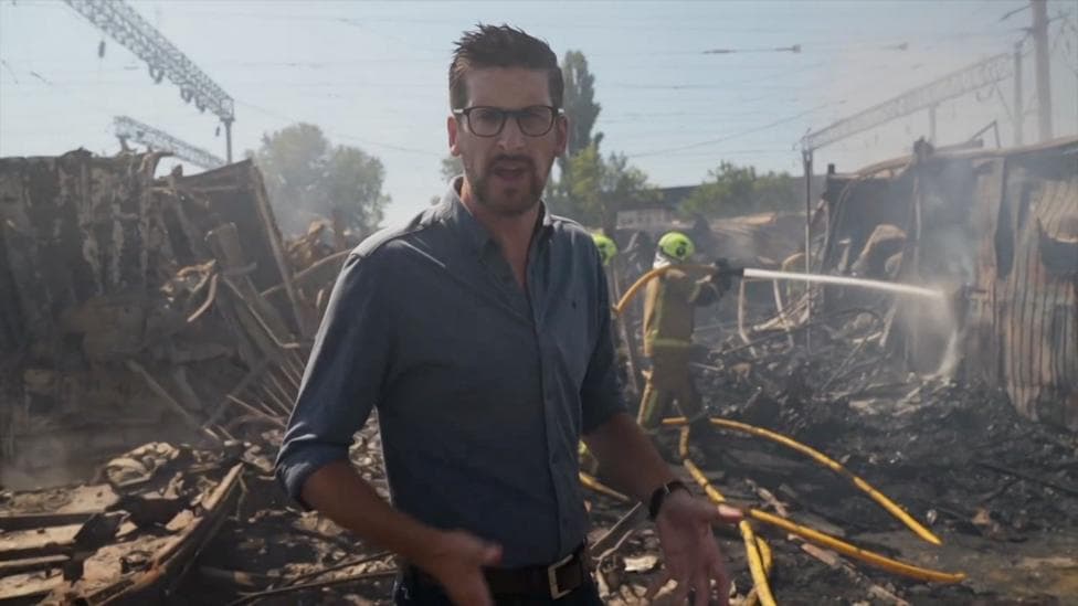 BBC visits smouldering Kyiv market after Russian strikes